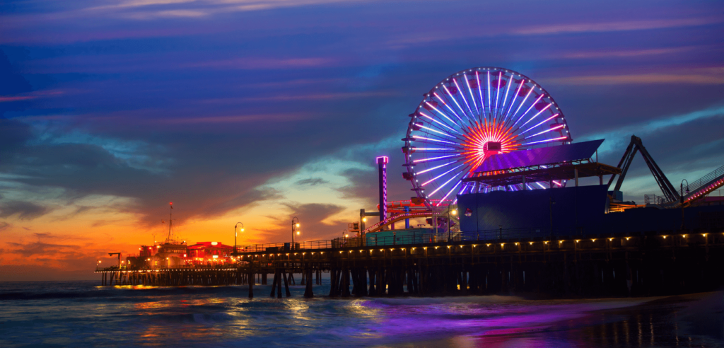 Best places to visit in los angeles: The colorful Ferris wheel at Santa Monica Pier during a beautiful sunset