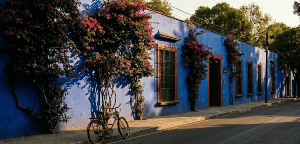 The vibrant blue façade of the Frida Kahlo Museum (Casa Azul) in Coyoacán, Mexico City—one of the most inspiring cultural stops and top things to do in Mexico City. Captured on Sony A7R V, 16mm, f8.