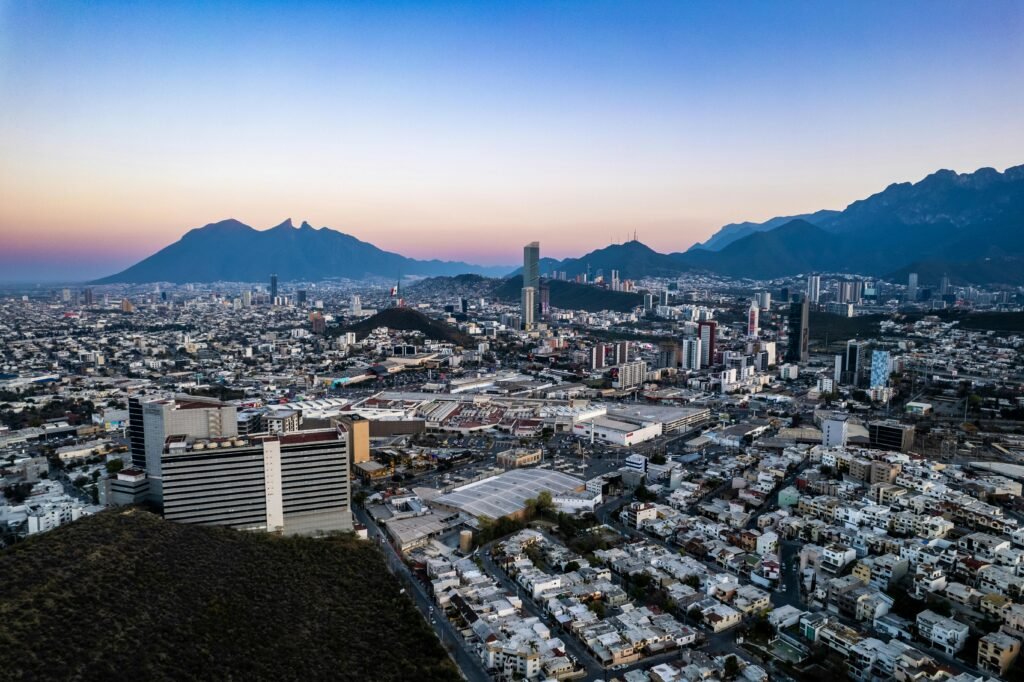 Things to do in Monterrey aerial view with Sierra Madre mountains at golden hour